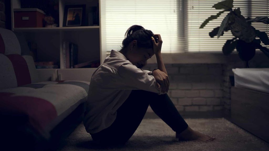 Business woman is depressed She felt stressed and alone in the house
